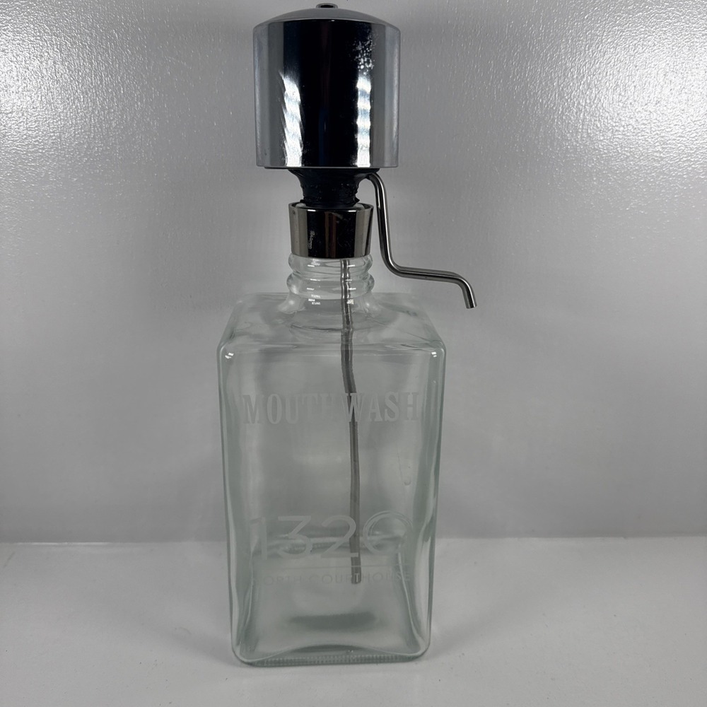 vintage glass liquor pump decanter with a‎ chrome-plated pump mechanism